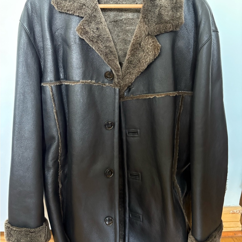 Brand new never worn leather with fur trim sherling  jacket , very light weight